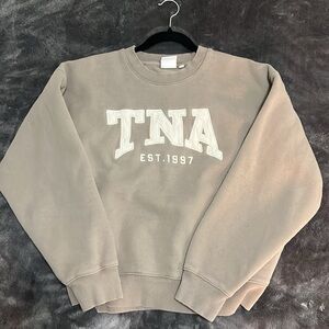 TNA sweatfleece sweater.